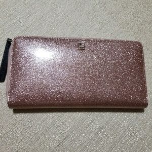 Lovely Rose gold Kate spade zip wallet